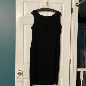 Black a- line dress with bow embellished neckline